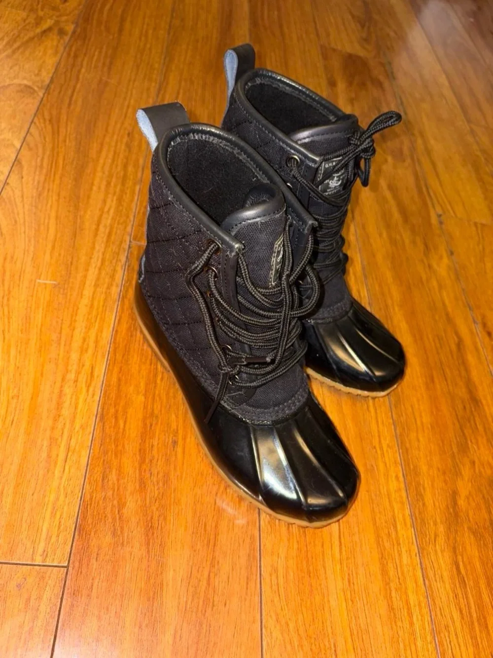 Black quilted water rain boots